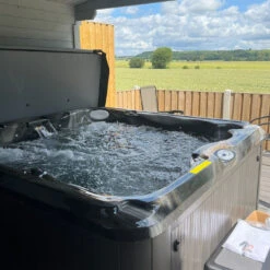 Jacuzzi® J235™ / J235IP™ - 6 Person Hot Tub With 1 Lounger -Hot Tubs Sales Shop J235MIDNIGHTDRIDTWOOD CustomerRowland3Square