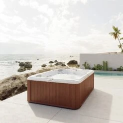 Jacuzzi® J235™ / J235IP™ - 6 Person Hot Tub With 1 Lounger -Hot Tubs Sales Shop JHT J235 Lifestyle RoastedChestnut Isosquare